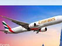 Passenger jet in Emirates livery over Dubai